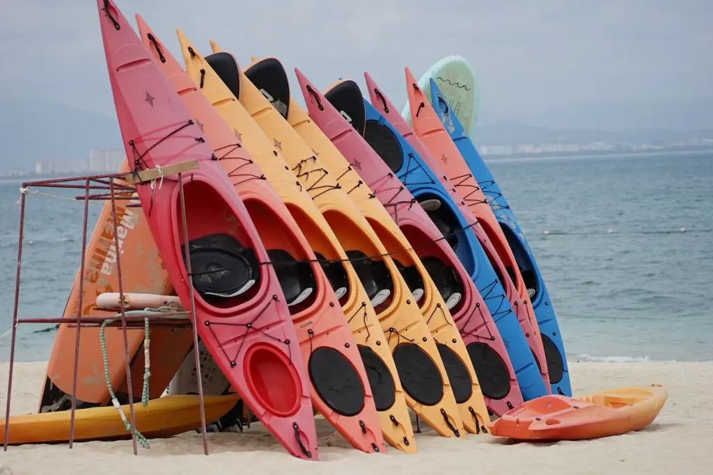 Various kayaks on the beach