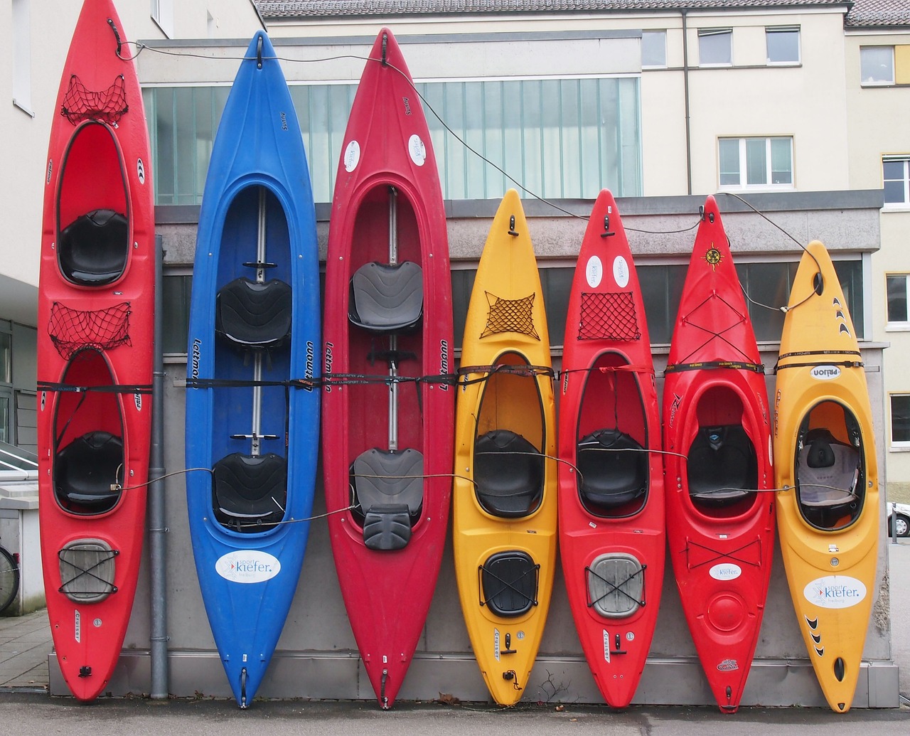 Different types of kayaks that weigh differently.