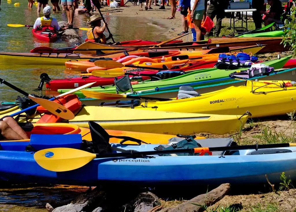 Several kayaks on shore
